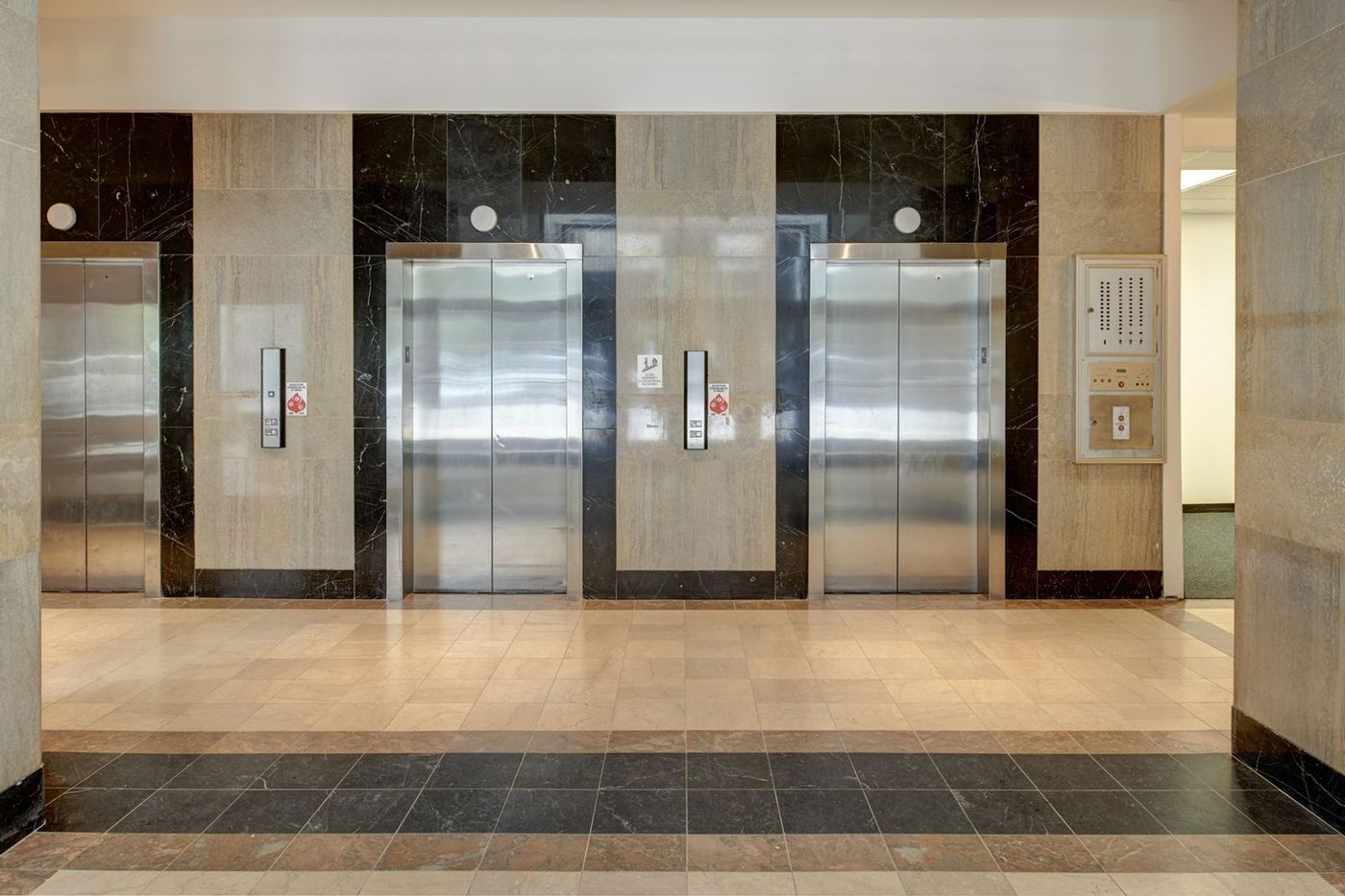 Marble and brass elevator lobby at The Fleming Building