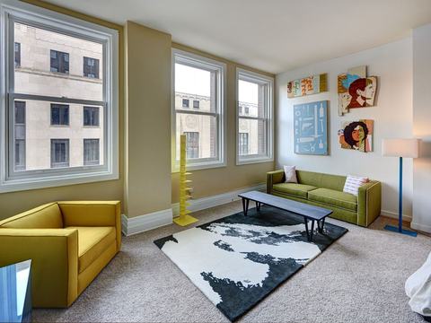 Corner living room with three historic windows